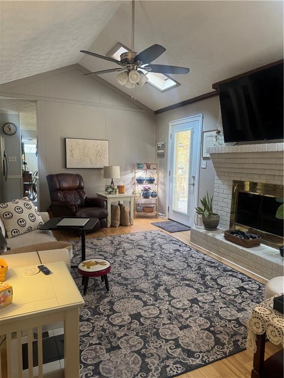 1455 Timberlane Road Snellville, GA 30078 - Photo 10 of 25 a living room with furniture a flat screen tv and a fireplace