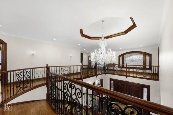 a view of hall way with furniture
