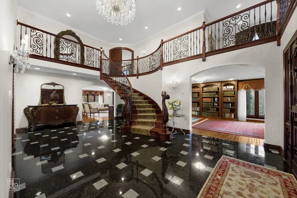 a view of entryway livingroom and hall