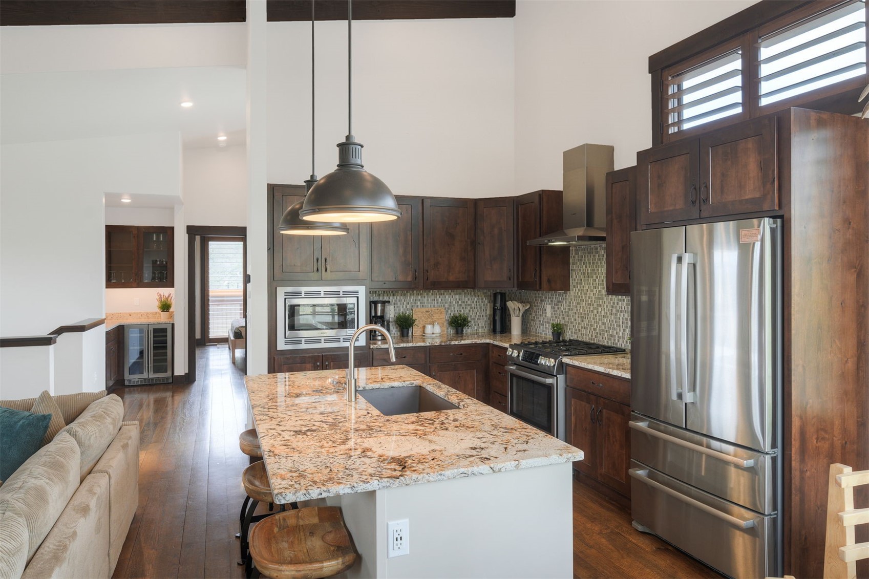 21 Moss Way Silverthorne, CO 80498 - Photo 11 of 50 a kitchen with stainless steel appliances granite countertop a refrigerator a stove and a sink