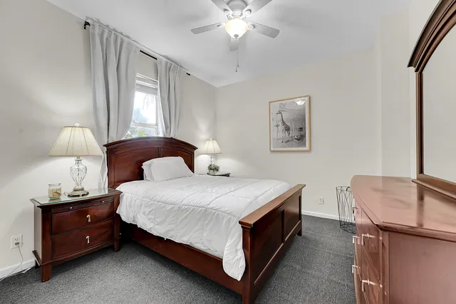 a bathroom with a sink toilet and vanity