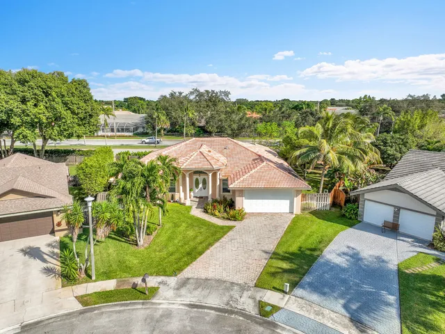 a view of a garden with a lake view