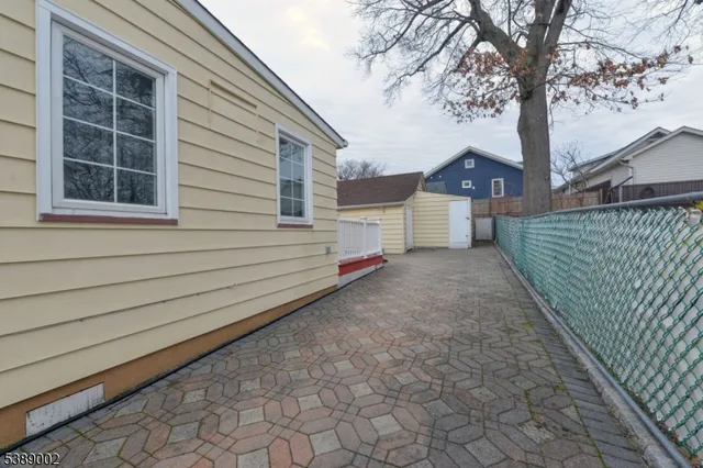 a house view with a backyard