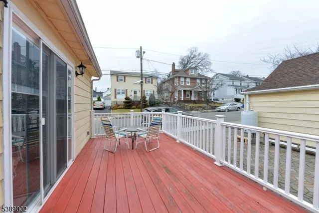 a view of a balcony with chairs