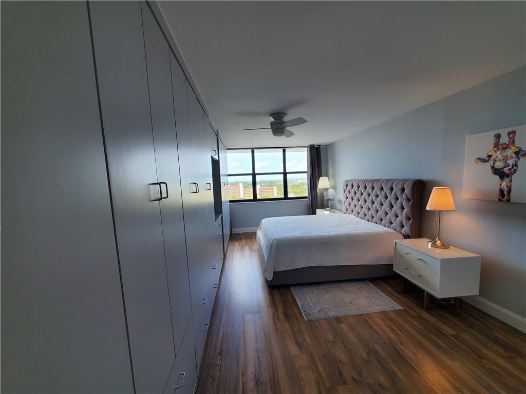 1401 North Riverside Drive, Unit 1503 Pompano Beach, FL 33062 - Photo 21 of 34 a bedroom with a bed and window