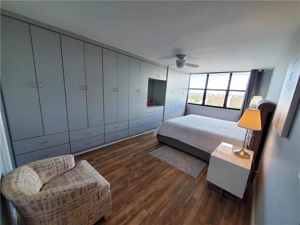 1401 North Riverside Drive, Unit 1503 Pompano Beach, FL 33062 - Photo 23 of 34 a living room with furniture and wooden floor