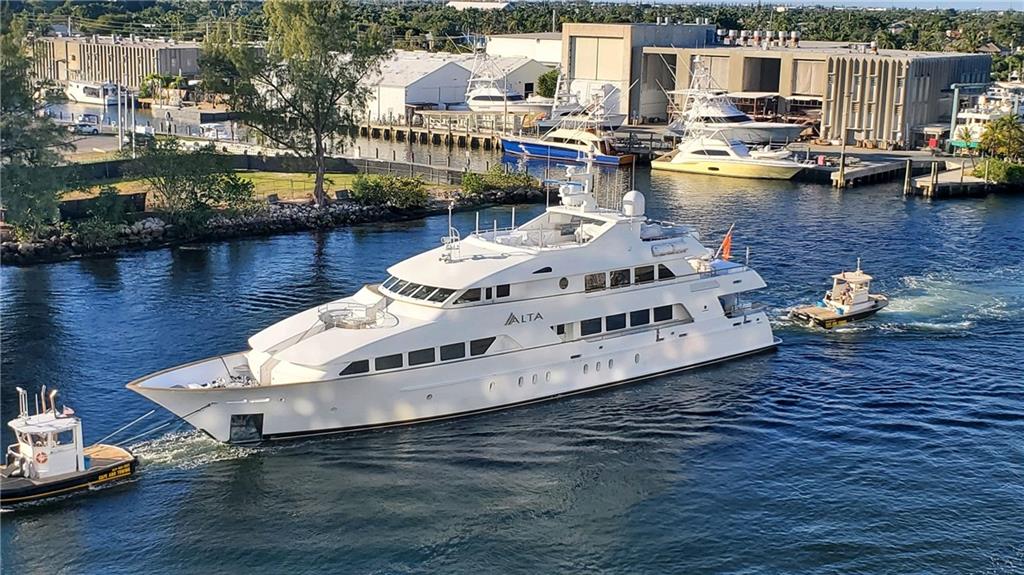 1401 North Riverside Drive, Unit 1503 Pompano Beach, FL 33062 - Photo 5 of 34 a large white body of water next to a building with large trees