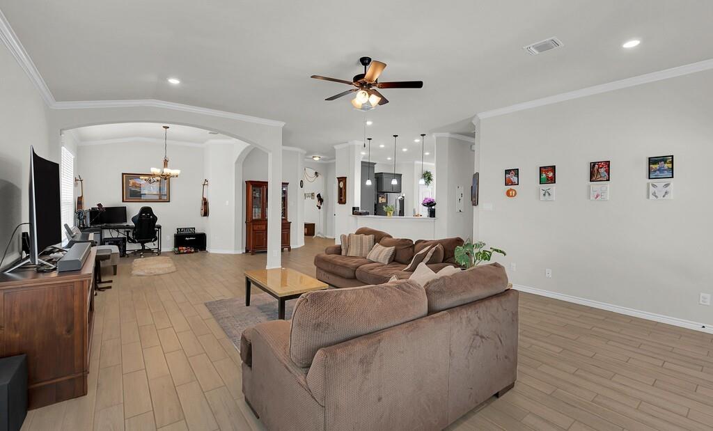 404 Calder Street Waco, TX 76712 - Photo 7 of 40 a living room with furniture and a flat screen tv