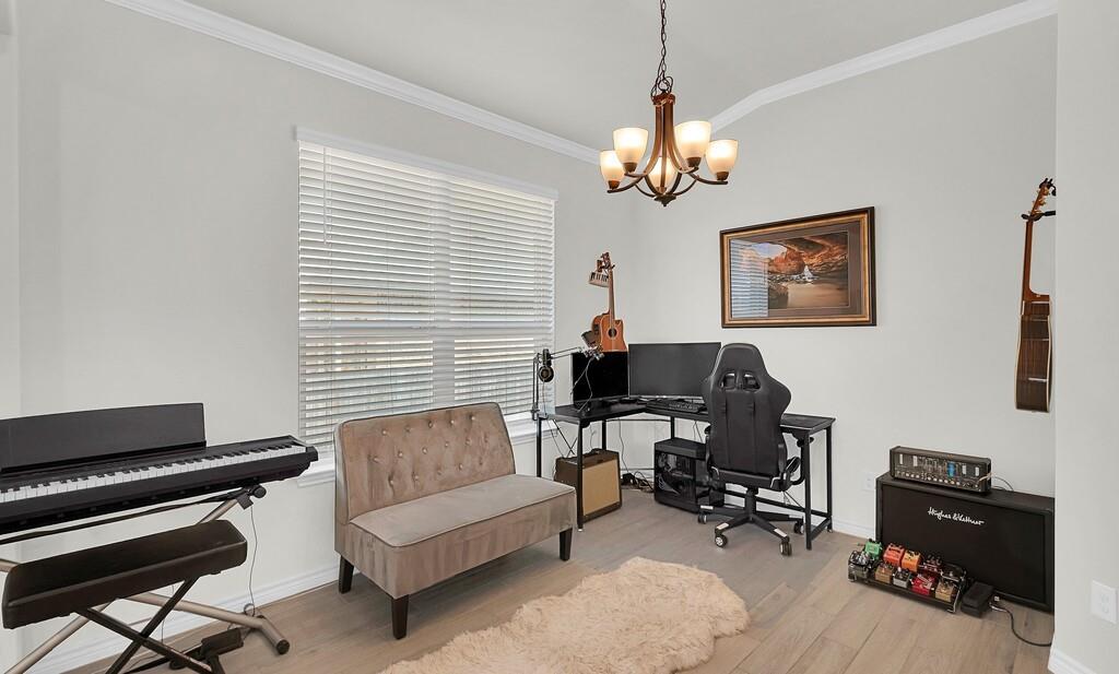404 Calder Street Waco, TX 76712 - Photo 9 of 40 a living room with furniture a piano and a window