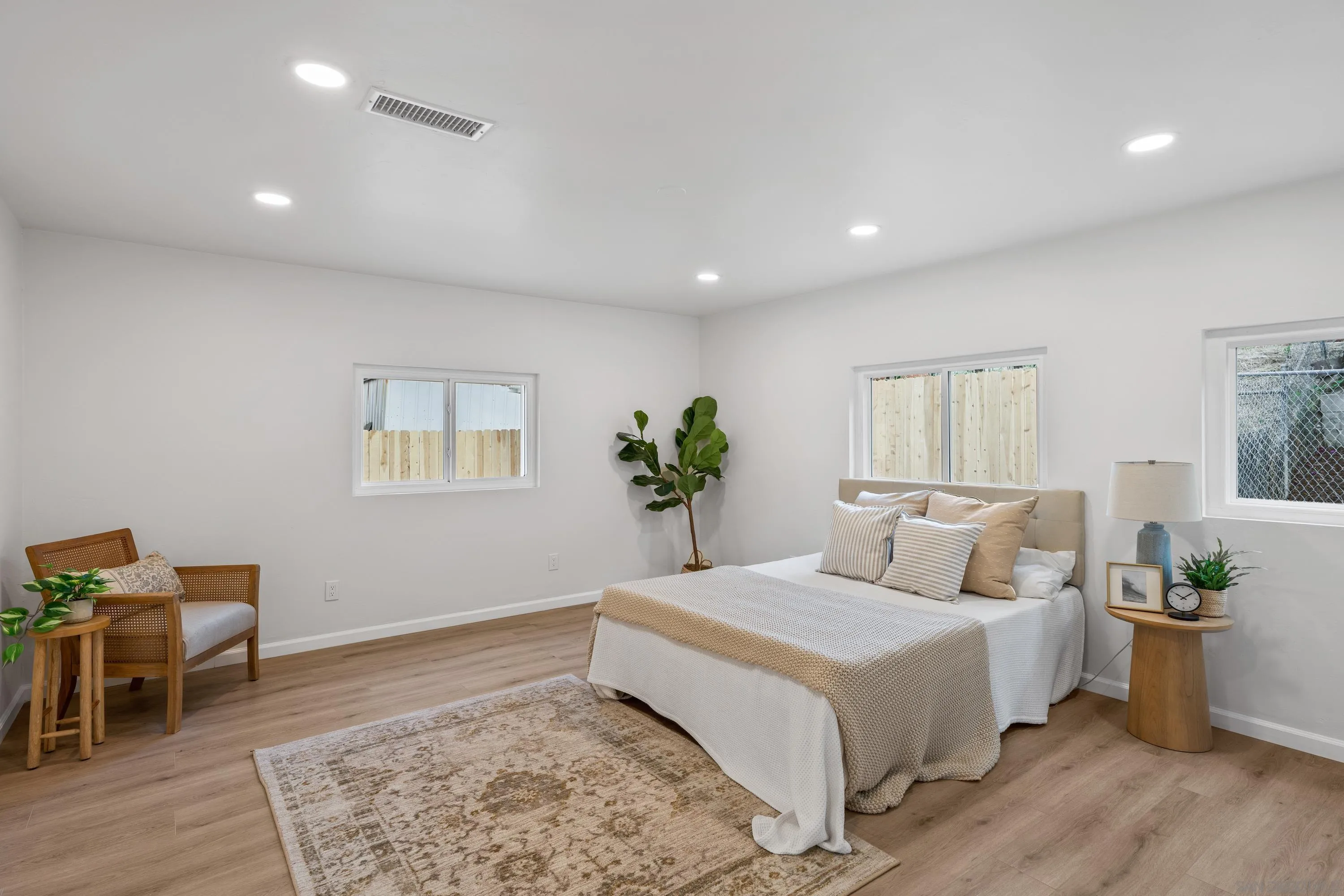 3457 Kenora Drive Spring Valley, CA 91977 - Photo 12 of 26 a bedroom with a bed and a table