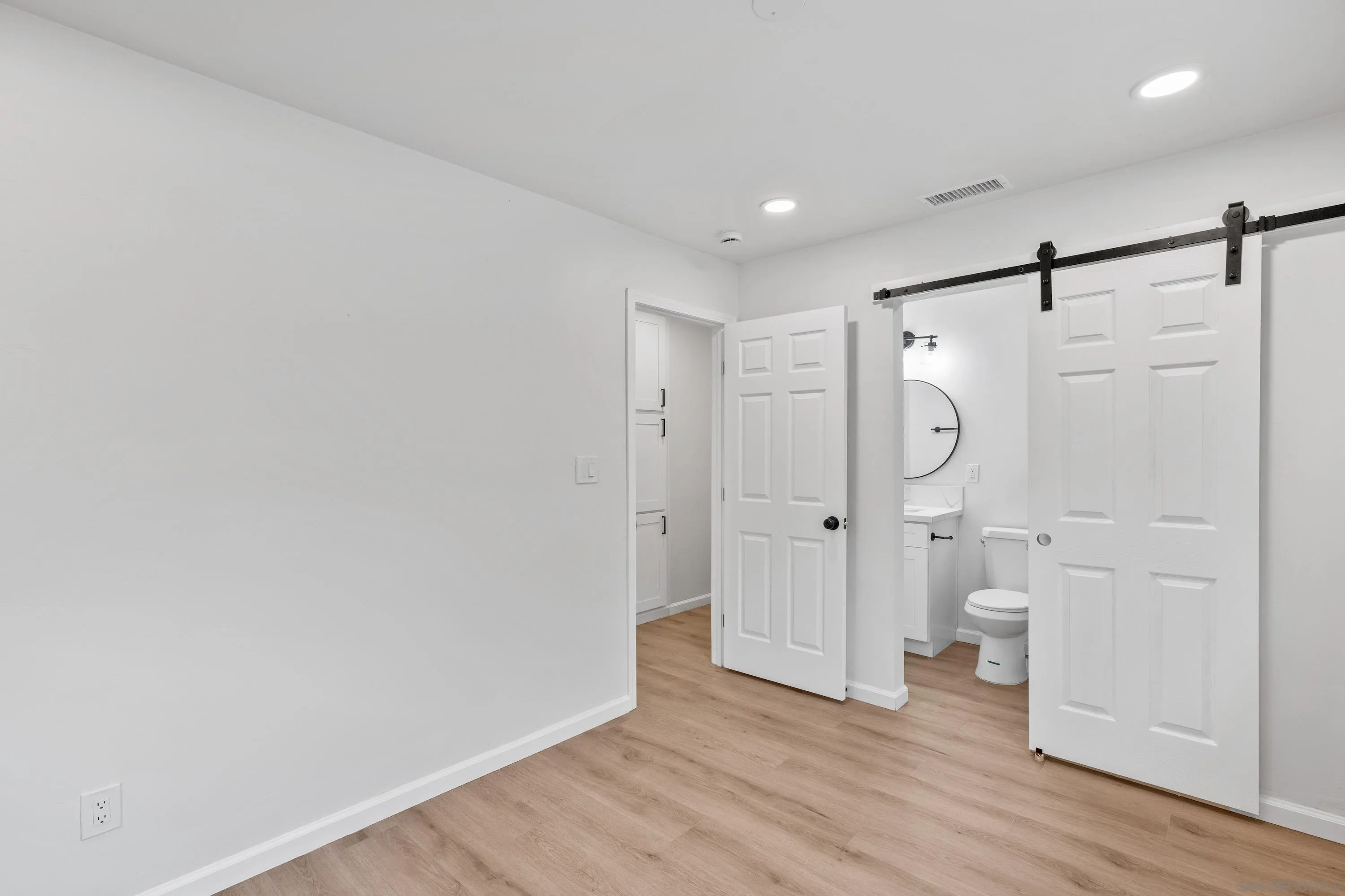 3457 Kenora Drive Spring Valley, CA 91977 - Photo 17 of 26 a view of a bathroom with a shower and a toilet