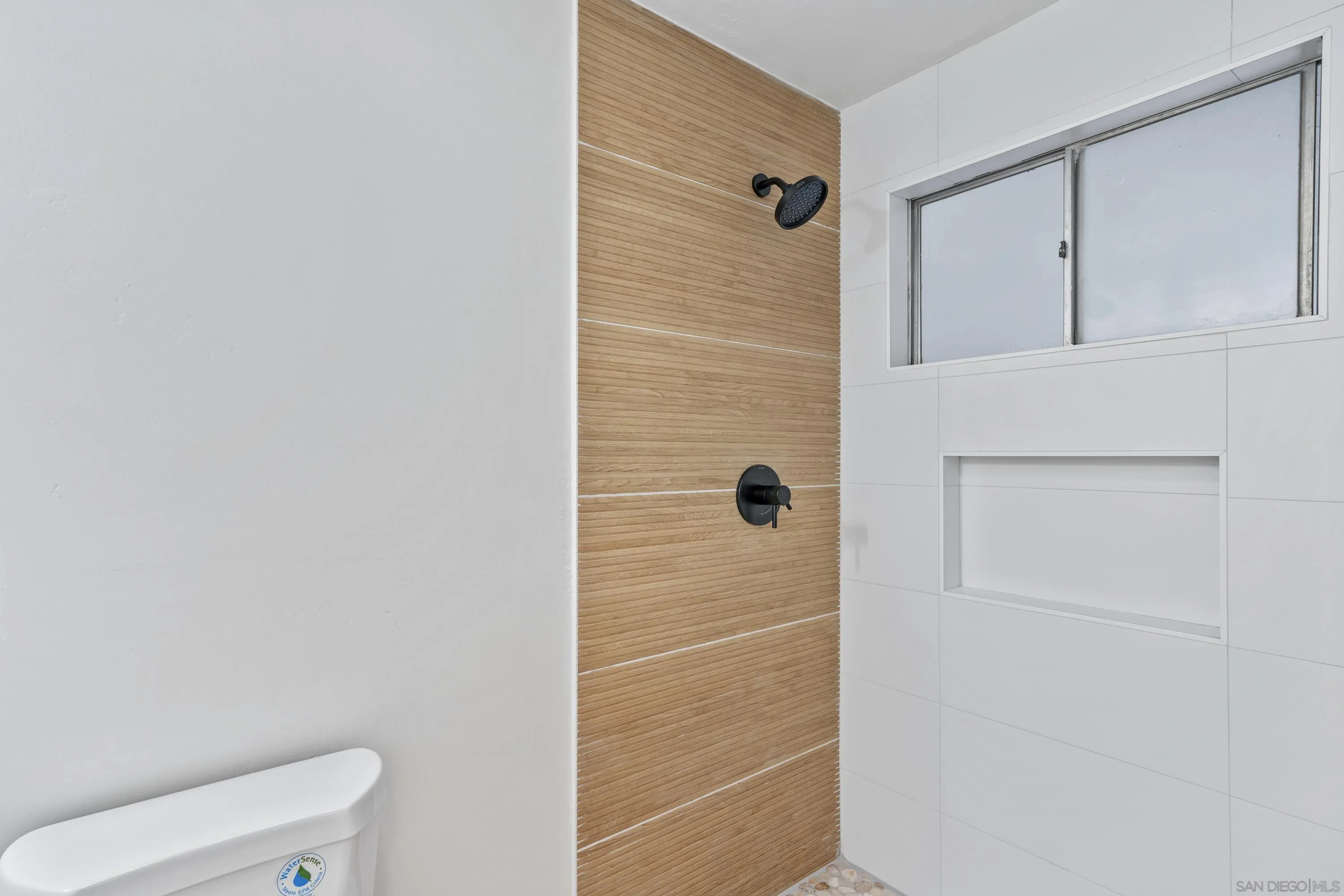 3457 Kenora Drive Spring Valley, CA 91977 - Photo 19 of 26 a bathroom with a shower