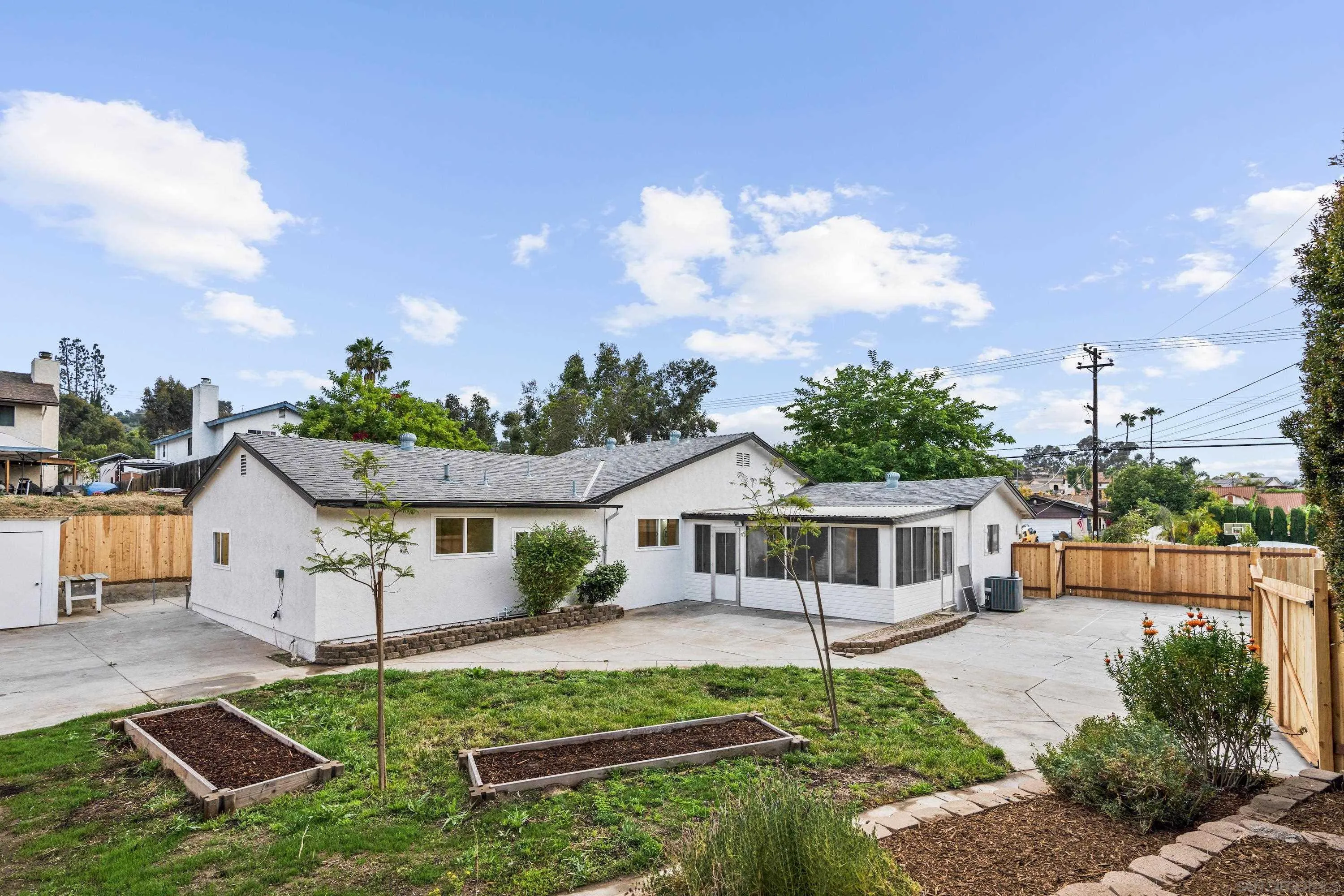 3457 Kenora Drive Spring Valley, CA 91977 - Photo 23 of 26 a front view of a house with garden