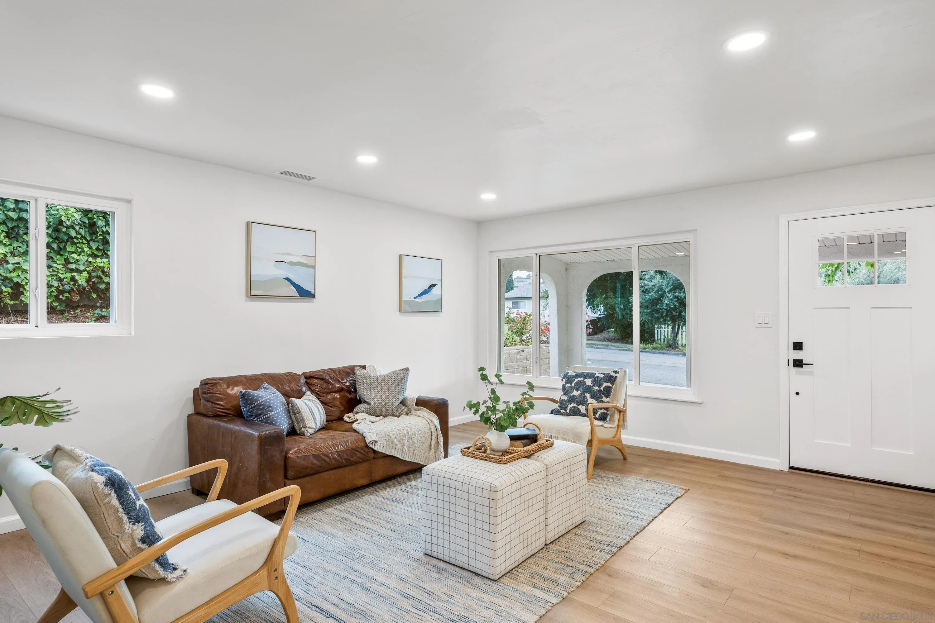 3457 Kenora Drive Spring Valley, CA 91977 - Photo 6 of 26 a living room with furniture and wooden floor