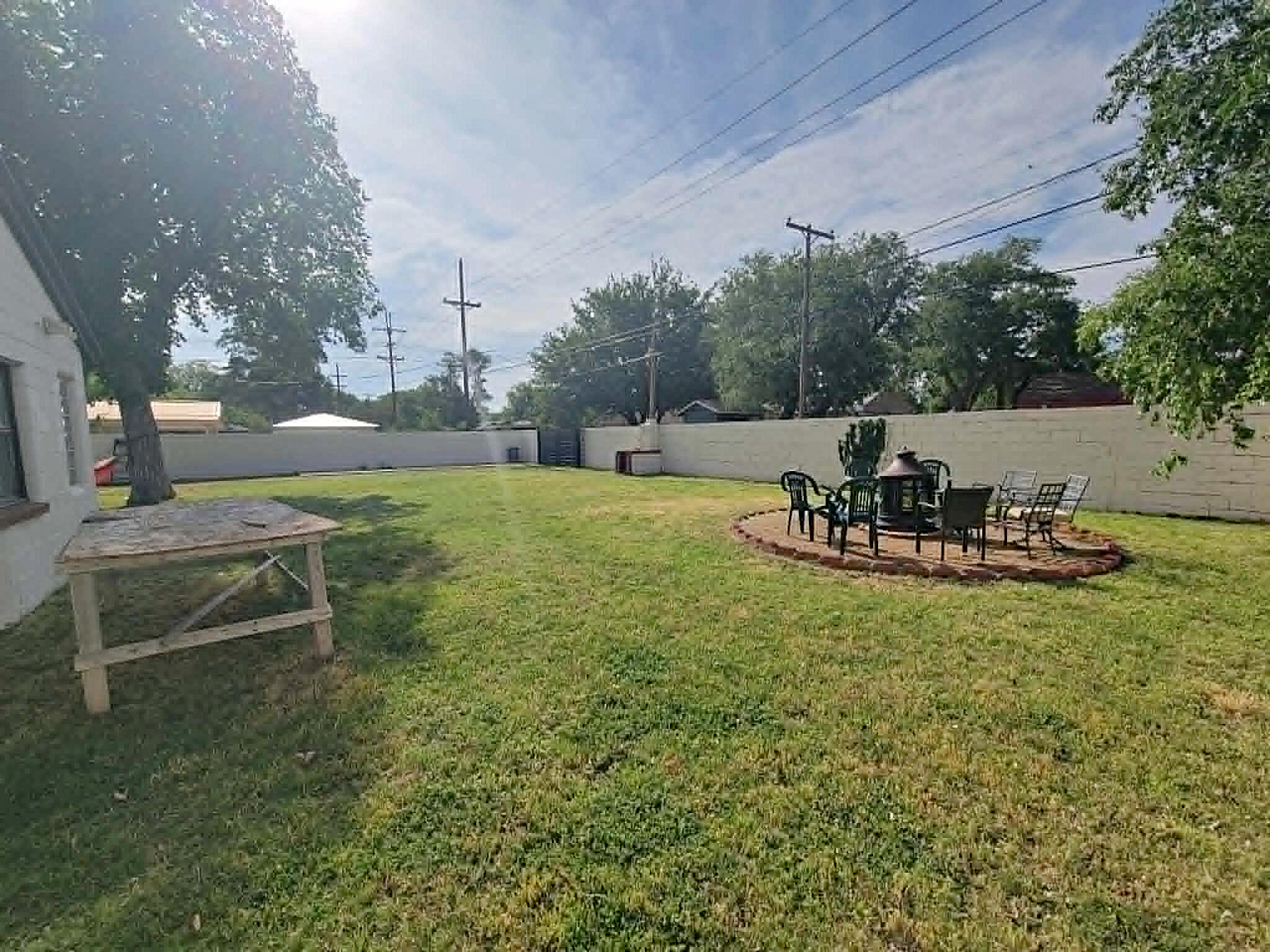 3105 29th Street Lubbock, TX 79410 - Photo 17 of 18 a view of a backyard with sitting area