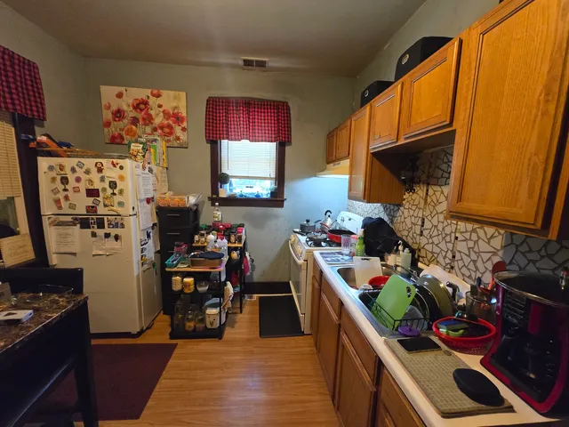 a room with furniture toys and a flat screen tv