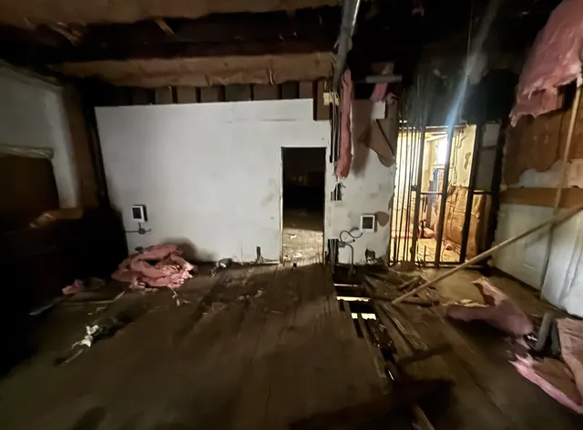 a view of room with furniture