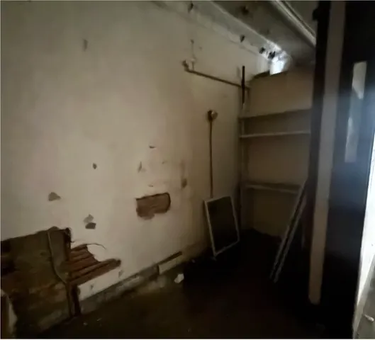 a view of a livingroom with wooden floor