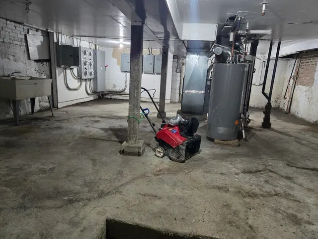 a view of a small house with a yard