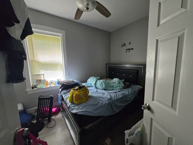 a living room with furniture and flat screen