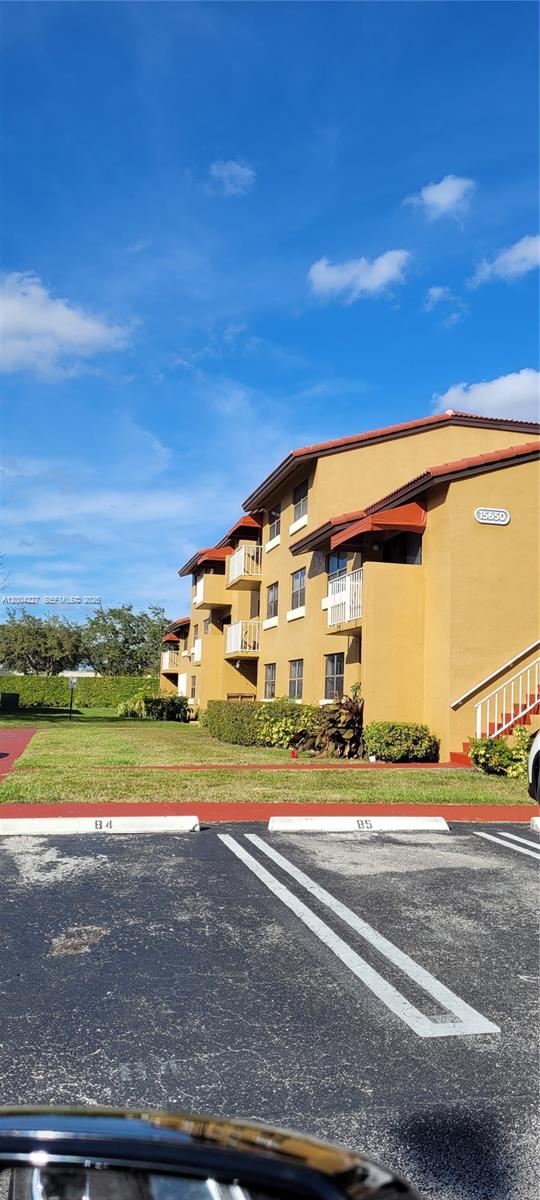15650 Southwest 80th Street, Unit F208 Miami, FL 33193 - Photo 2 of 19 a view of a big building