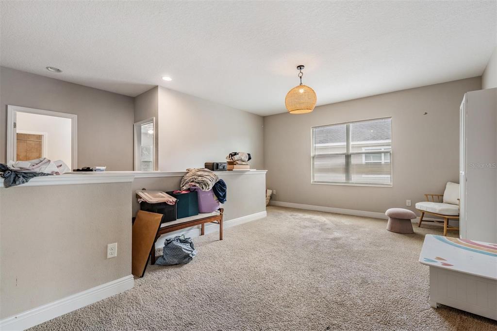 3016 Alachua Place New Port Richey, FL 34655 - Photo 23 of 65 a living room with furniture and a window