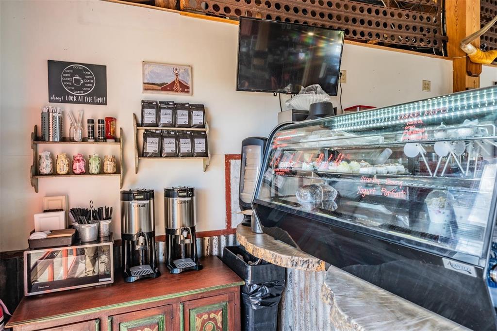 3016 Alachua Place New Port Richey, FL 34655 - Photo 58 of 65 a kitchen with lots of bottles of alcohol