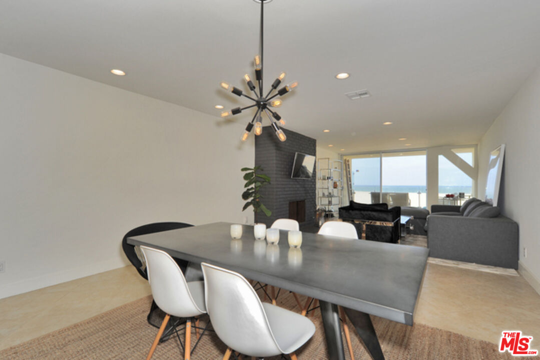 4 Lighthouse Street, Unit 5 Marina del Rey, CA 90292 - Photo 7 of 25 a view of a dining room with furniture and wooden floor
