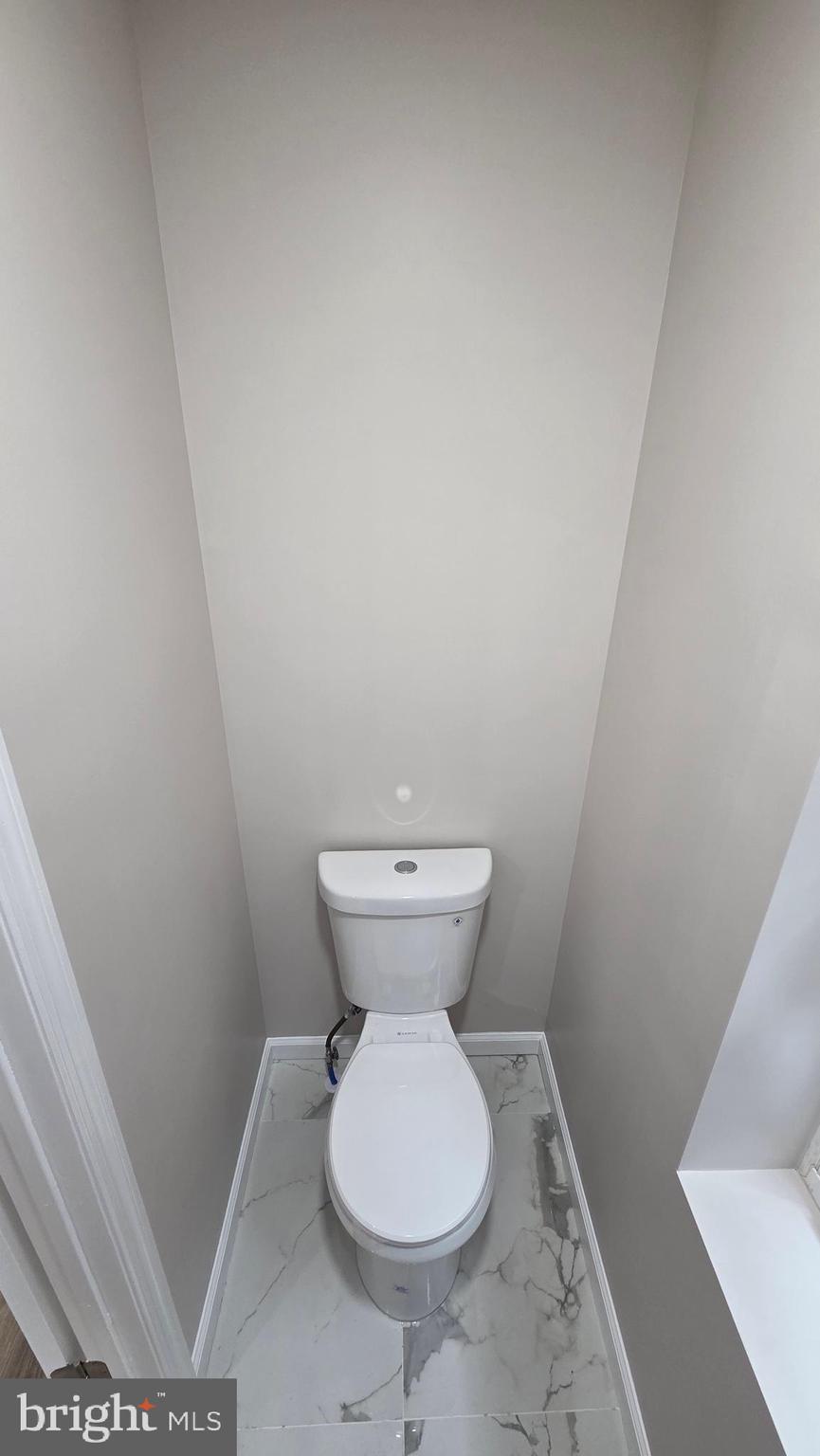 5706 Vandike Street Philadelphia, PA 19135 - Photo 15 of 32 a bathroom with a toilet
