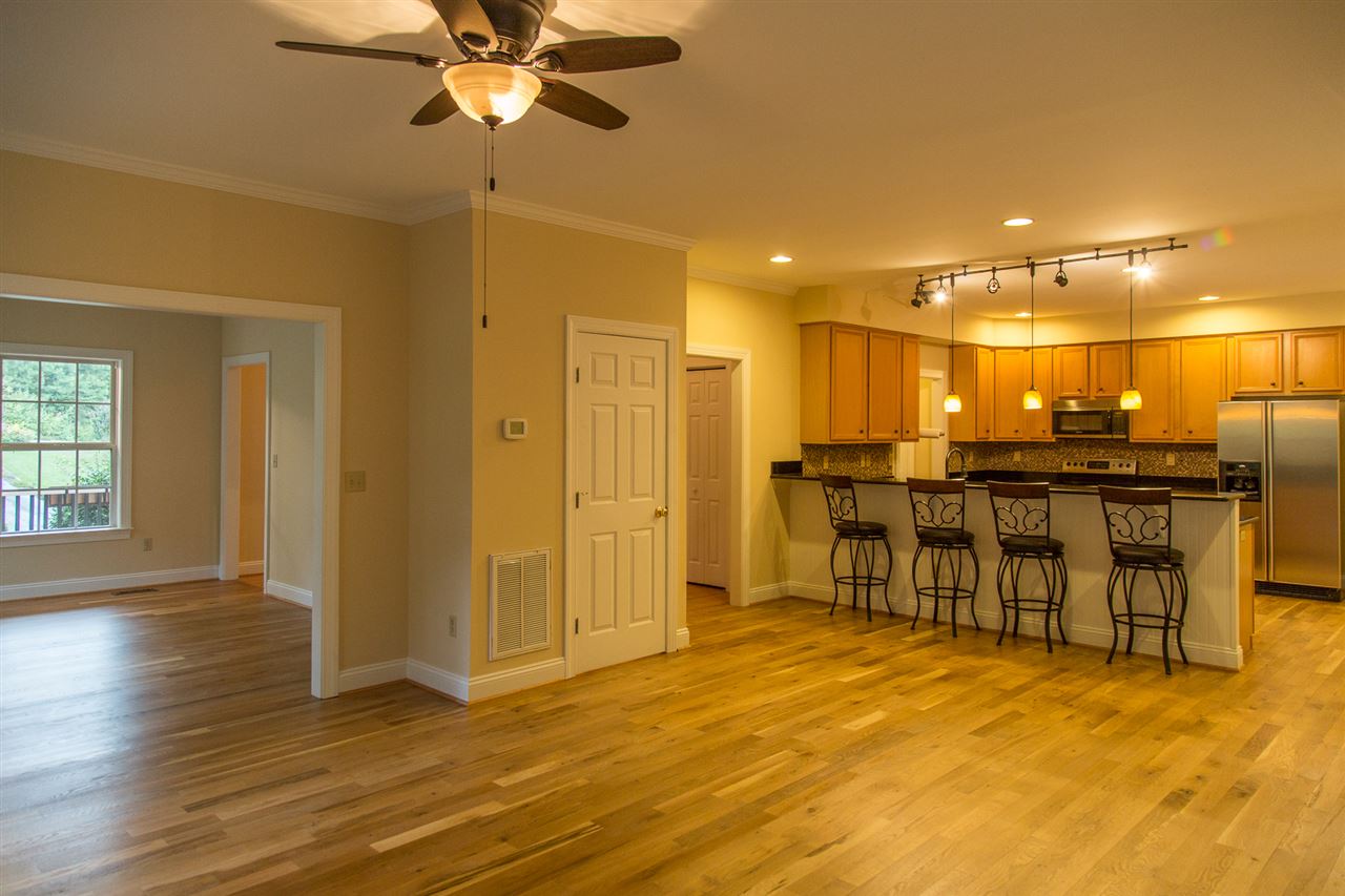72 Willow Way Road Barboursville, VA 22923 - Photo 23 of 50 The large open concept kitchen and family room make entertaining a snap. The single door on the left leads to the basement.