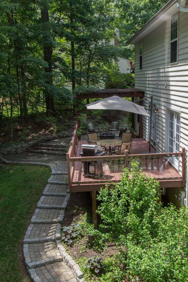 72 Willow Way Road Barboursville, VA 22923 - Photo 3 of 50 Constructed of Rumble Stone Cafe Trap Wall Block and Pavestone Medium Wall Block, this gorgeous durable walkway opens to a sitting area, perfect for a fire bowl. The deck has Trex decking with DecKorator tempered, shatter resistant glass pickets.