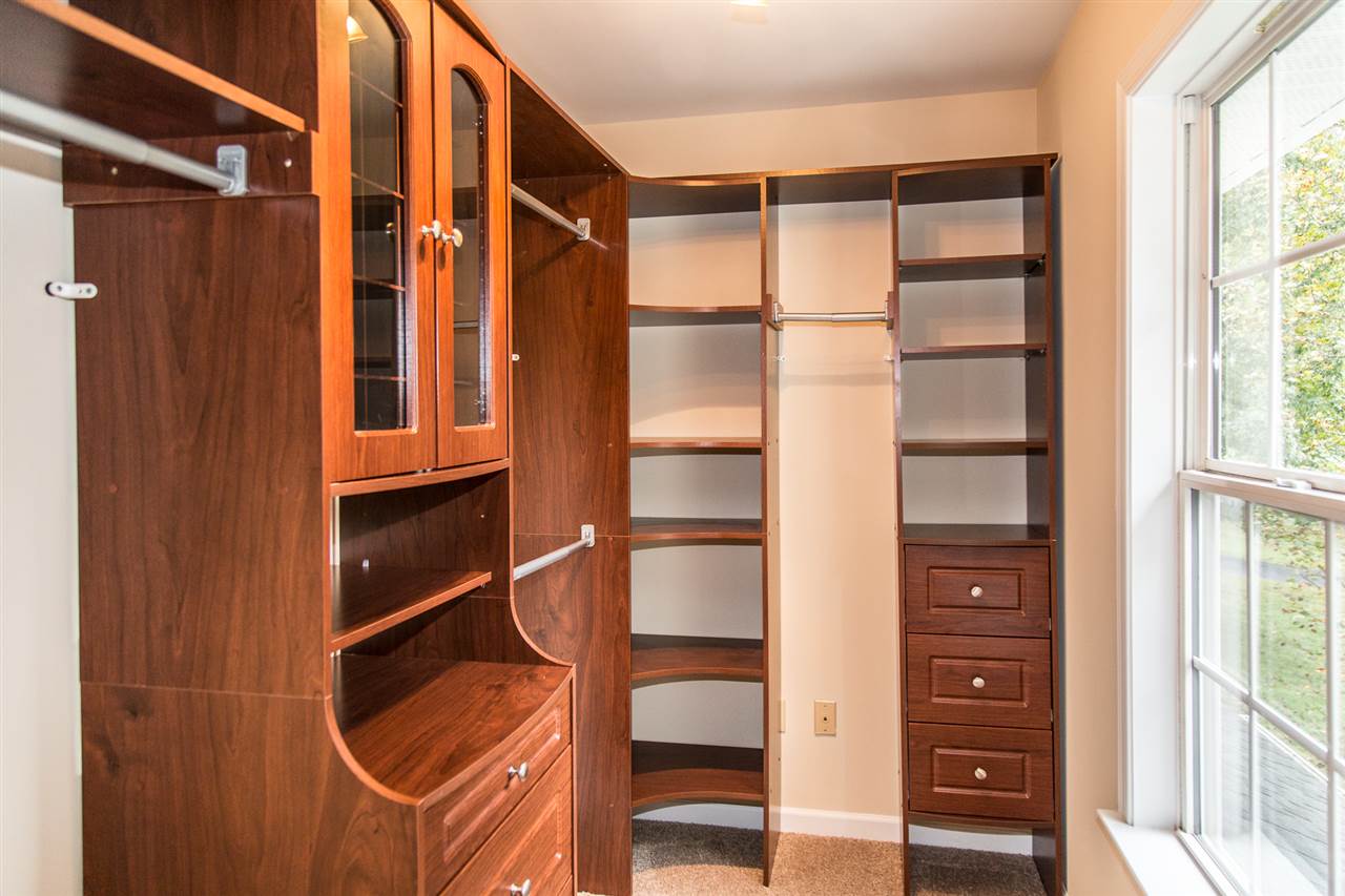 72 Willow Way Road Barboursville, VA 22923 - Photo 31 of 50 Both of the walk-in closets in the Master Suite have a wooden closet system. This walk in closet has its own window!