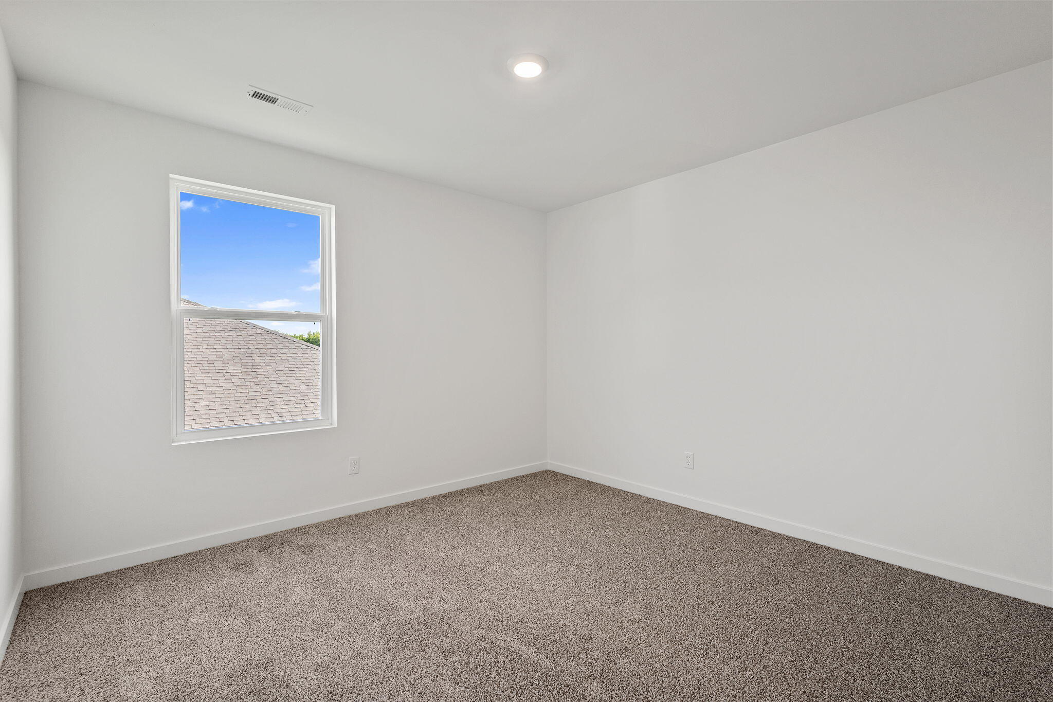 10681 Blaine Street Crown Point, IN 46307 - Photo 22 of 25 an empty room with a window
