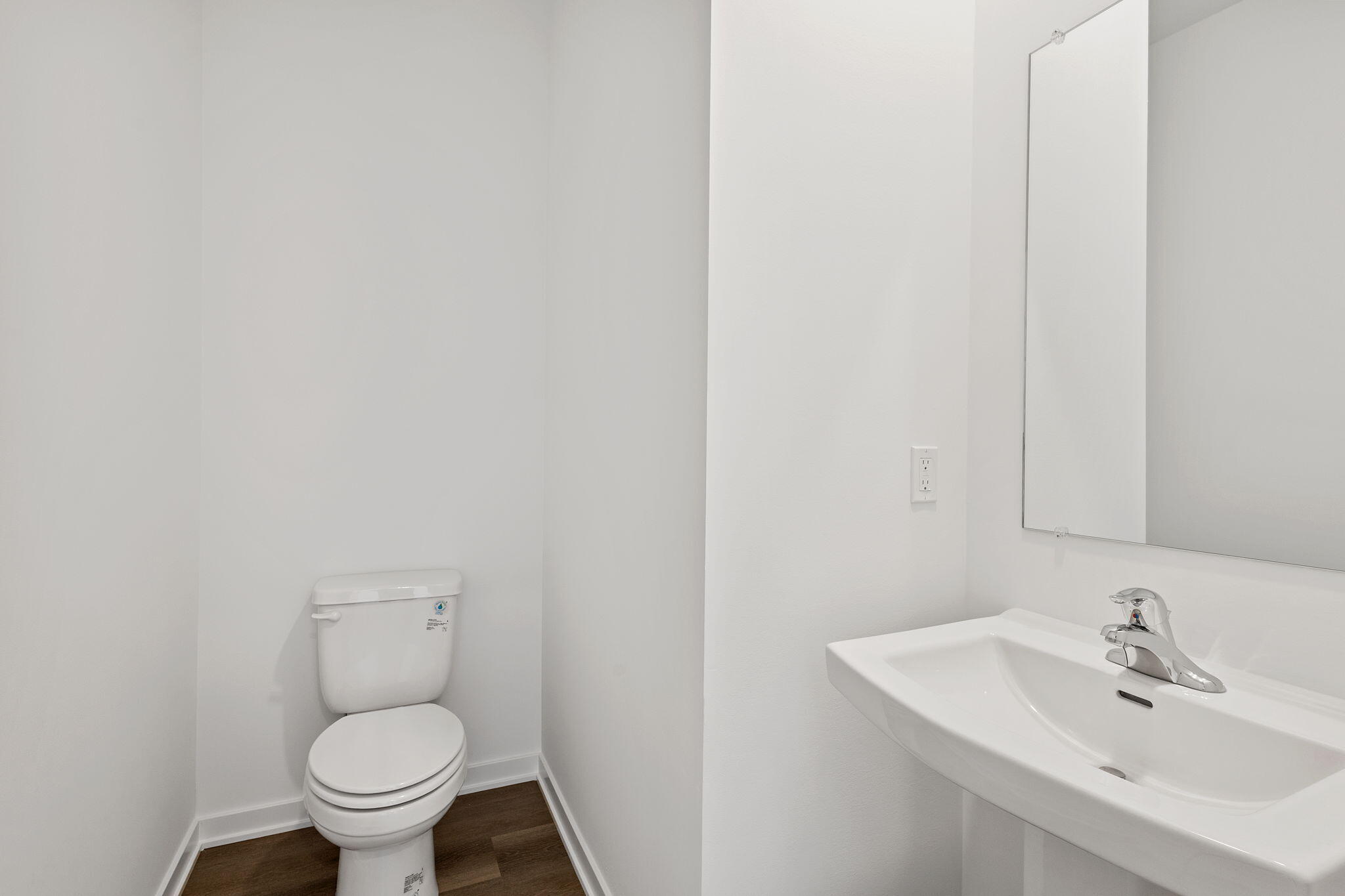 10681 Blaine Street Crown Point, IN 46307 - Photo 10 of 25 a bathroom with a sink and a toilet