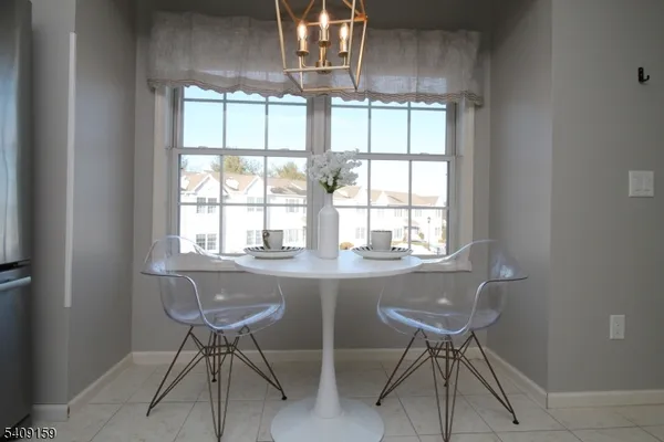 a workspace with furniture and window