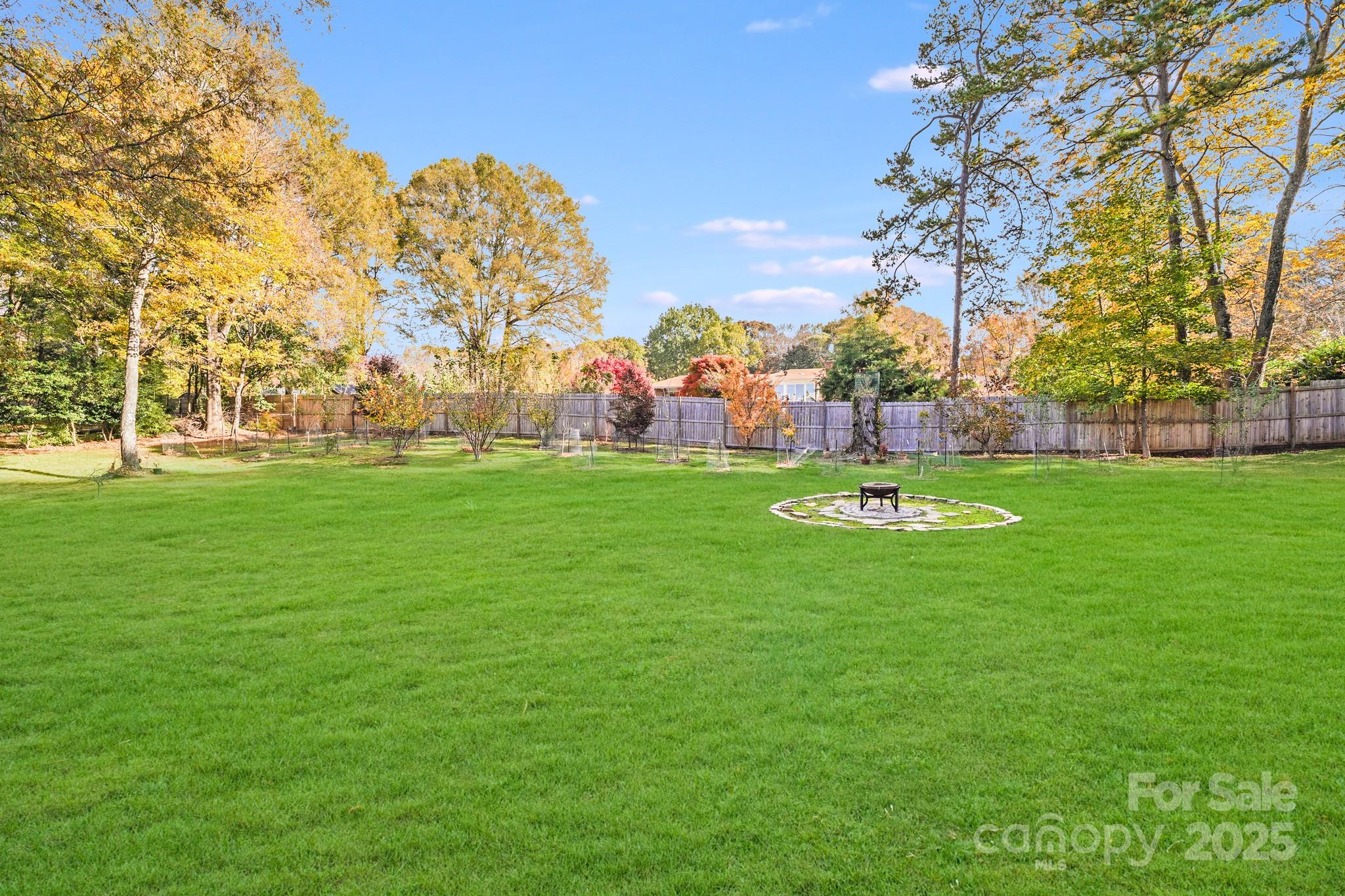 5329 Kuykendall Road Charlotte, NC 28270 - Photo 4 of 18 a view of a park with large trees