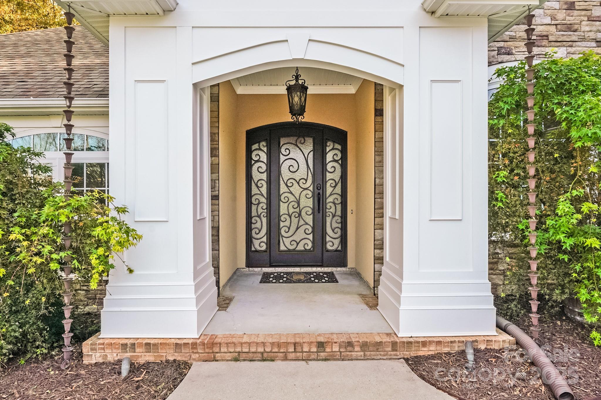 5329 Kuykendall Road Charlotte, NC 28270 - Photo 7 of 18 a front view of a house with a yard