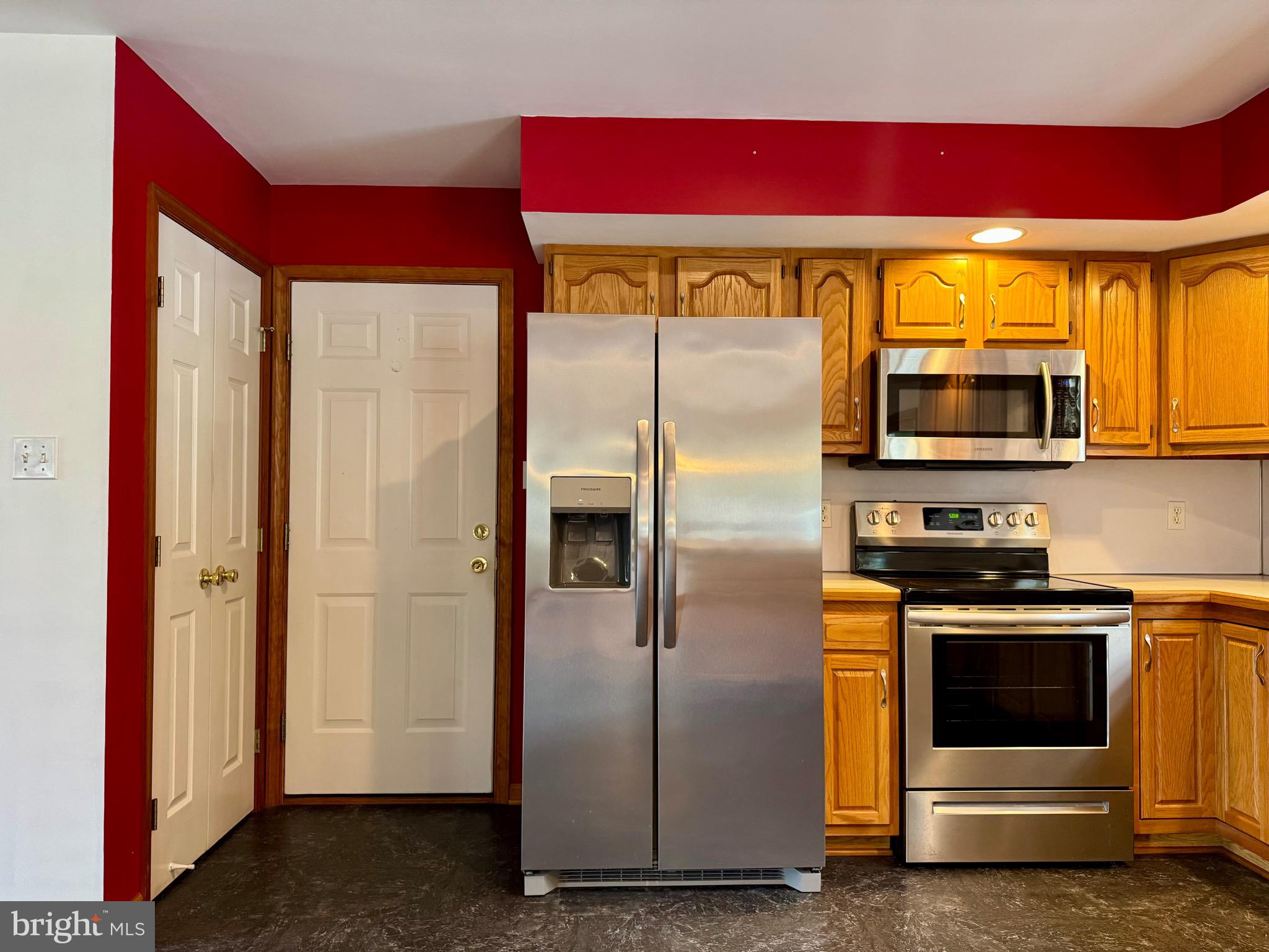 35 Coachman Drive Rising Sun, MD 21911 - Photo 19 of 58 a kitchen with stainless steel appliances granite countertop a refrigerator and a microwave