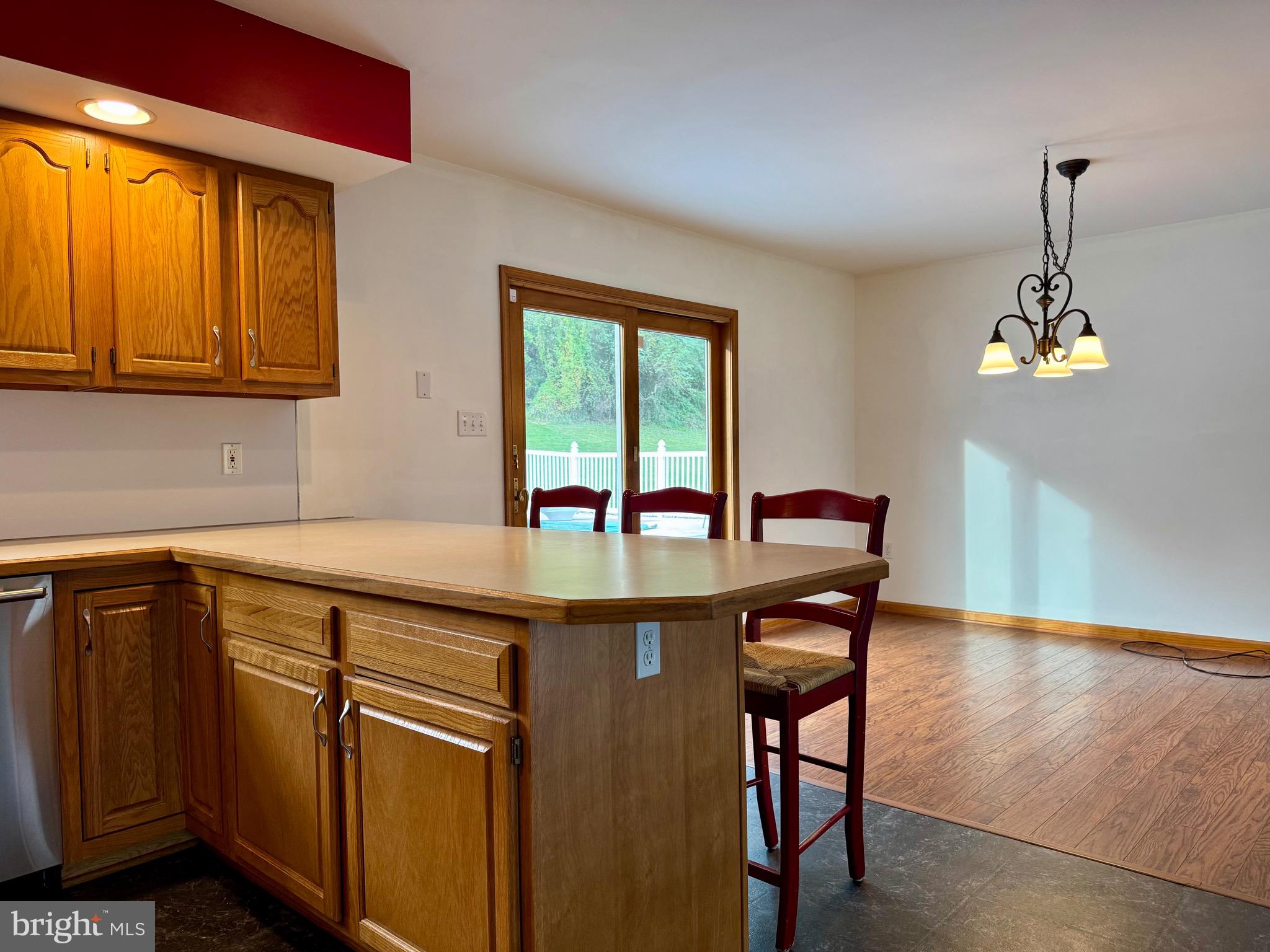 35 Coachman Drive Rising Sun, MD 21911 - Photo 22 of 58 a kitchen with stainless steel appliances granite countertop a sink a stove and a wooden floors