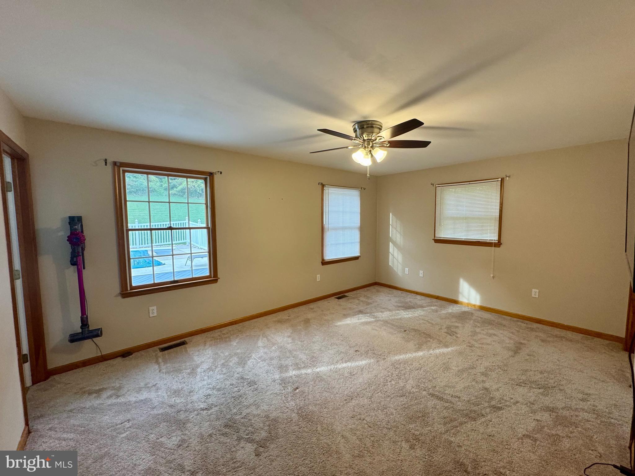 35 Coachman Drive Rising Sun, MD 21911 - Photo 27 of 58 an empty room with windows and fan