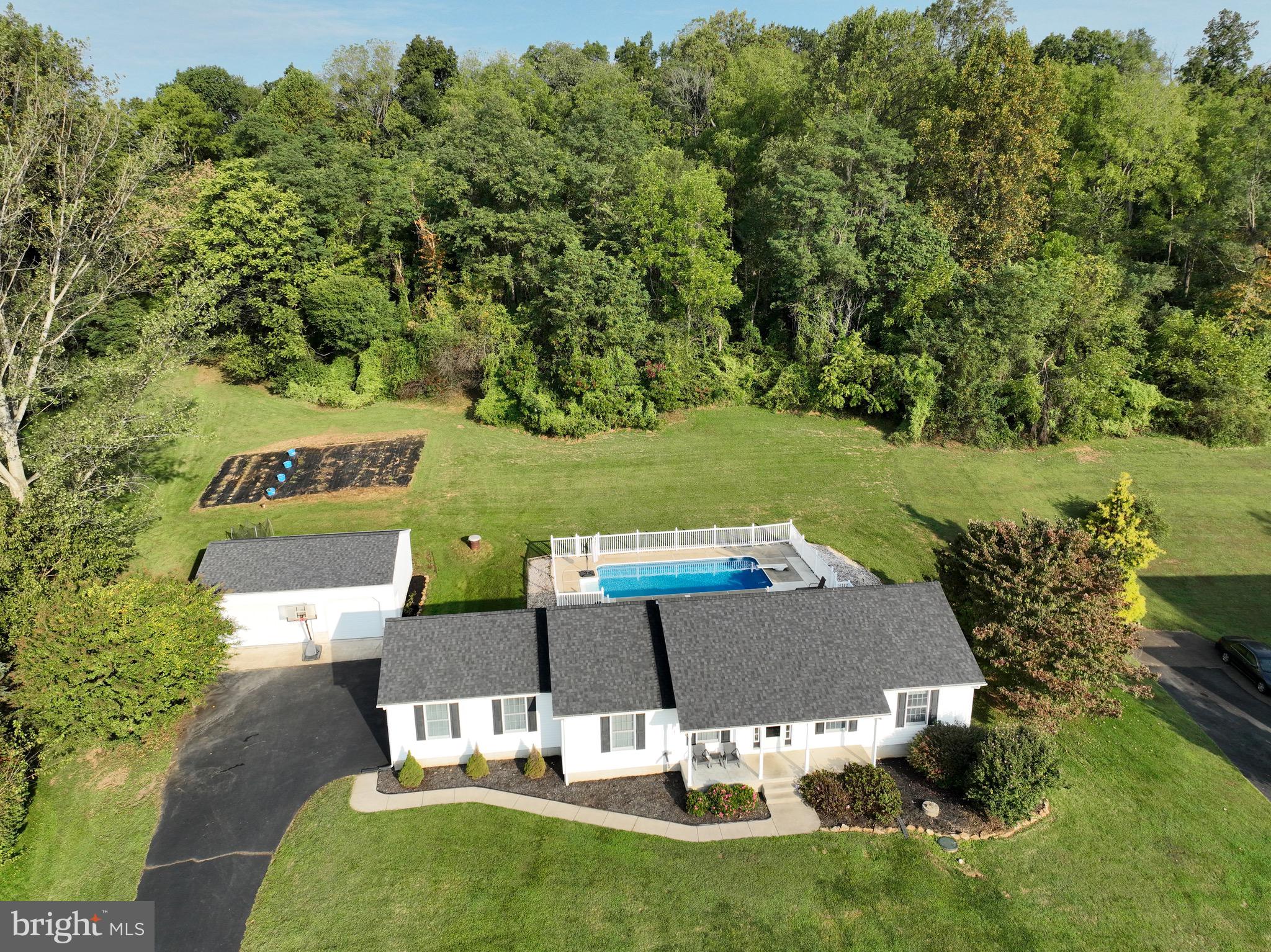 35 Coachman Drive Rising Sun, MD 21911 - Photo 3 of 58 an aerial view of a house with yard swimming pool and outdoor seating