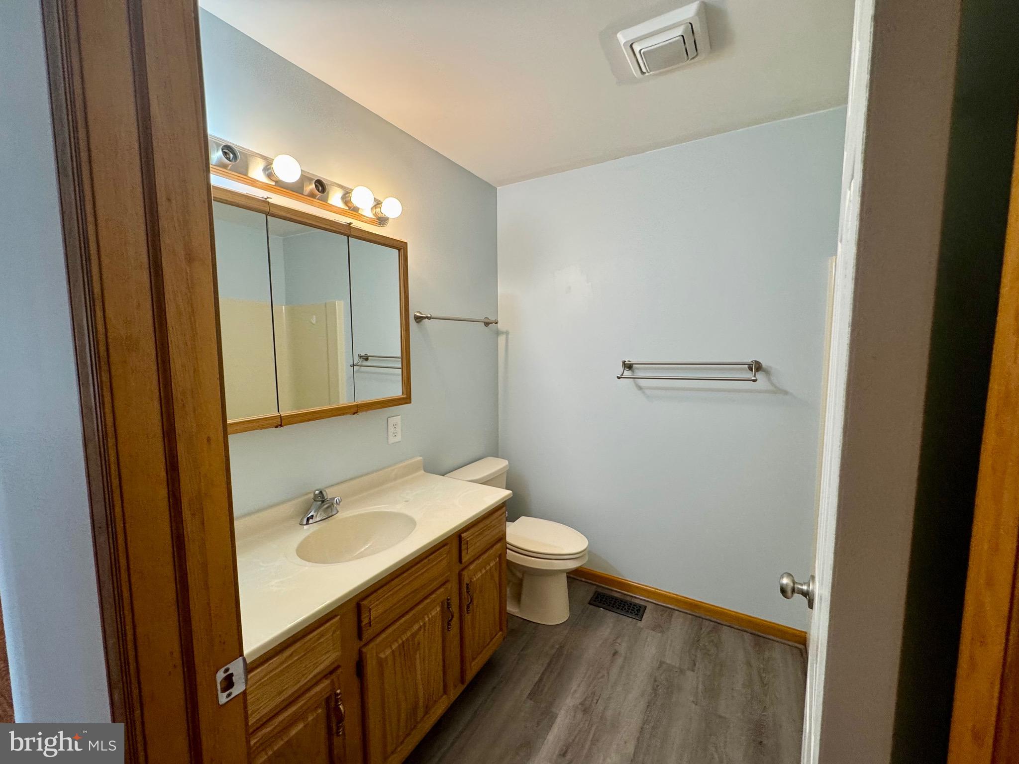 35 Coachman Drive Rising Sun, MD 21911 - Photo 35 of 58 a bathroom with a sink and a mirror