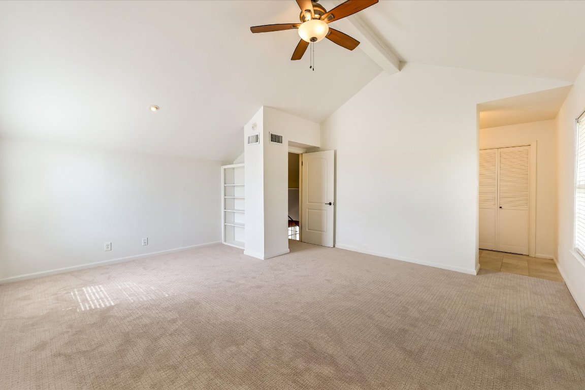 8806 El Rey Boulevard Austin, TX 78737 - Photo 14 of 35 Bedroom with carpet flooring, ceiling fan and a window with natural light