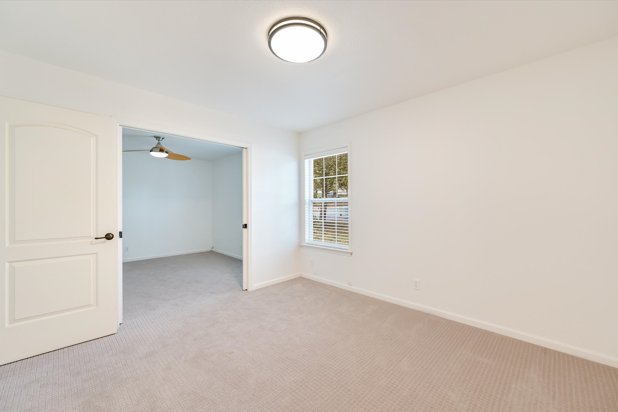 8806 El Rey Boulevard Austin, TX 78737 - Photo 18 of 38 an empty room with windows and closet