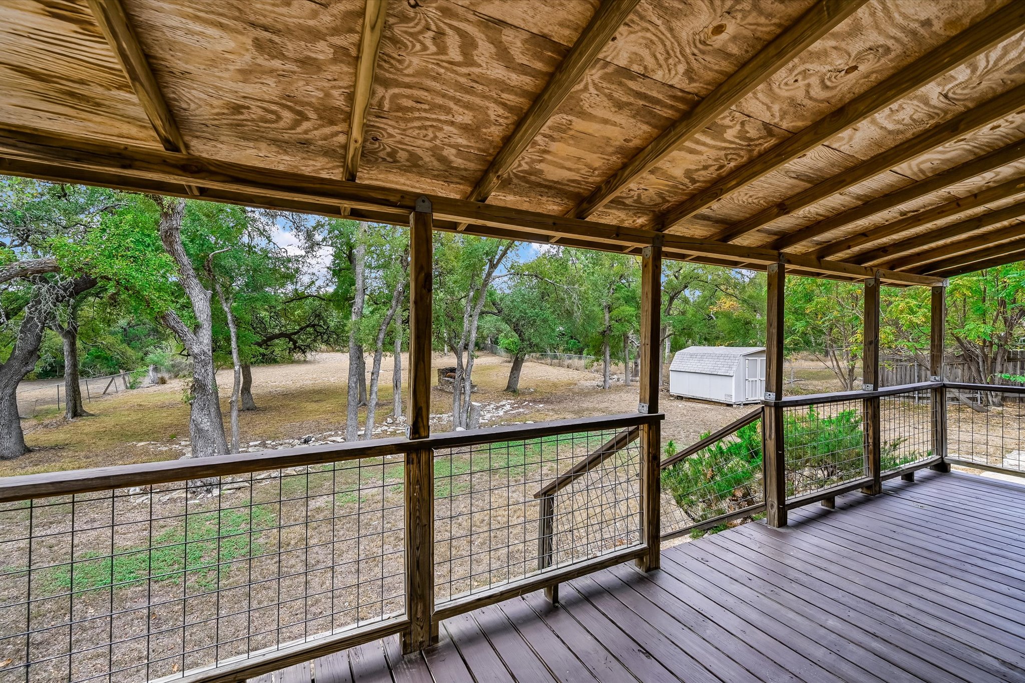 8806 El Rey Boulevard Austin, TX 78737 - Photo 20 of 38 a view of outdoor space with wooden deck