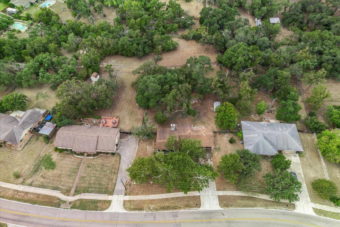 8806 El Rey Boulevard Austin, TX 78737 - Photo 29 of 35 Aerial view of property and surrounding area facing west.
