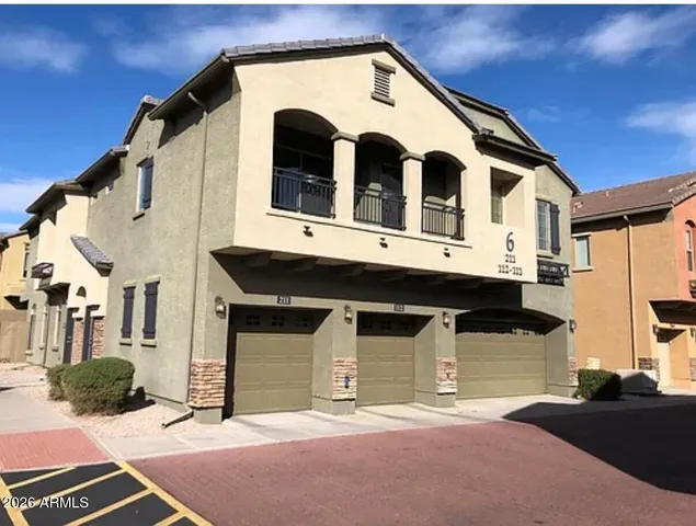 a front view of a house with parking