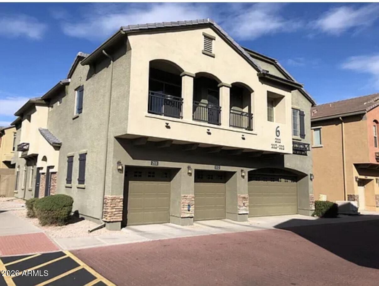 a front view of a house with parking