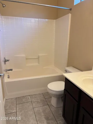 a bathroom with a sink a toilet and a bathtub