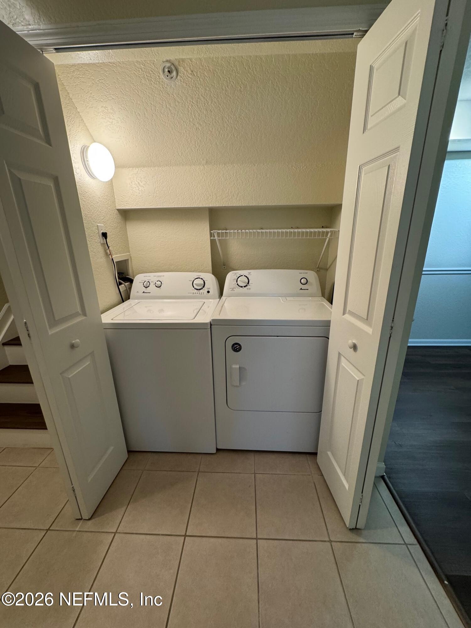 8550 Touchton Road, Unit 1727 Jacksonville, FL 32216 - Photo 15 of 15 a utility room with dryer and washer